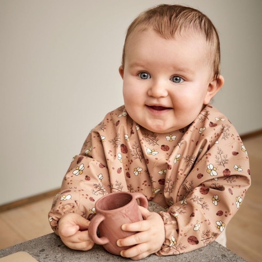 nuuroo Luna spiseforklæde Hagesmæk Sand - Flower bee
