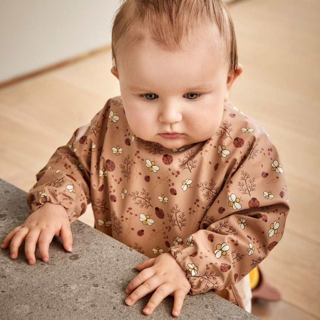 nuuroo Luna spiseforklæde Hagesmæk Sand - Flower bee